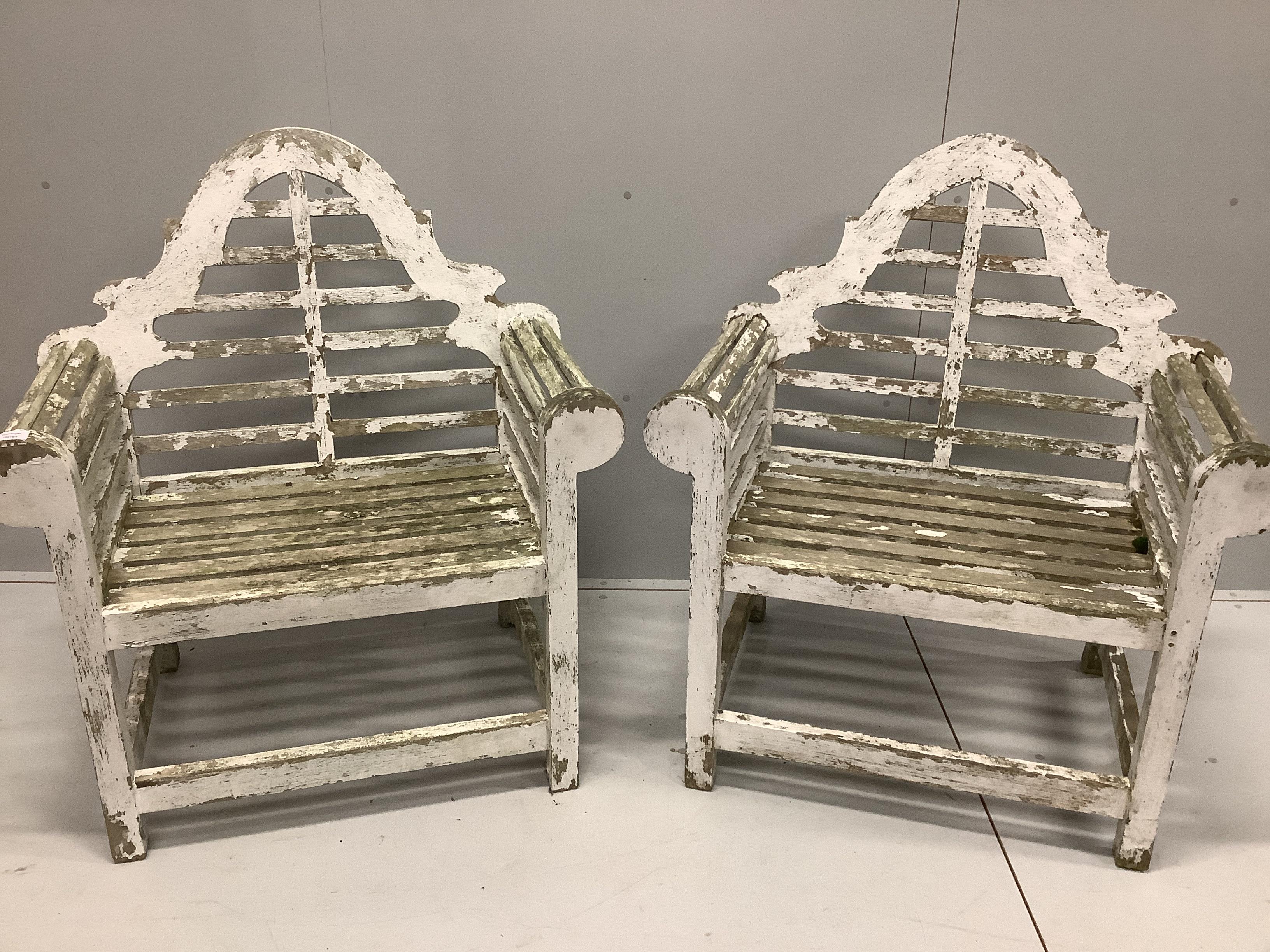 A pair of painted teak Lutyens style garden armchairs, width 90cm, depth 59cm, height 106cm